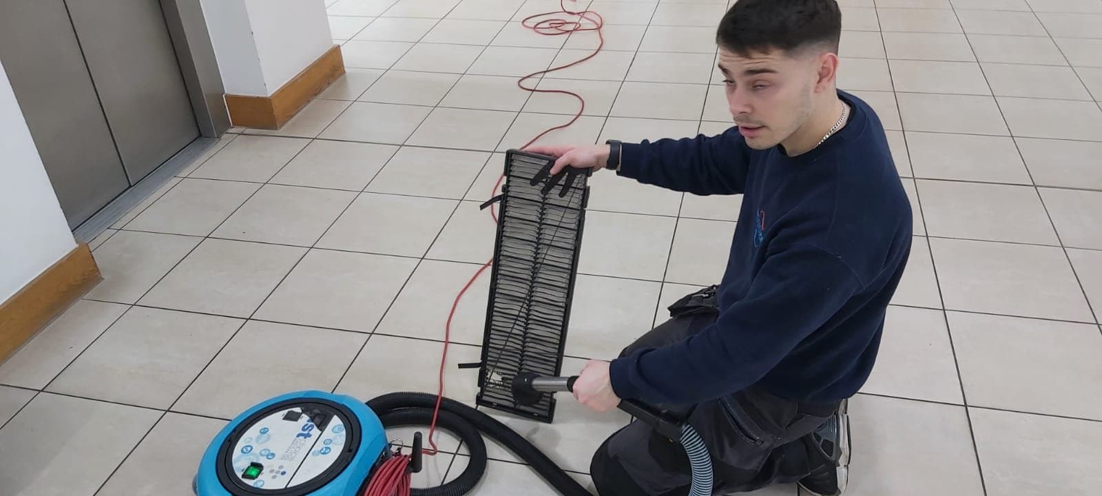 Rossair engineer carrying out planned maintenance on commercial building services plant