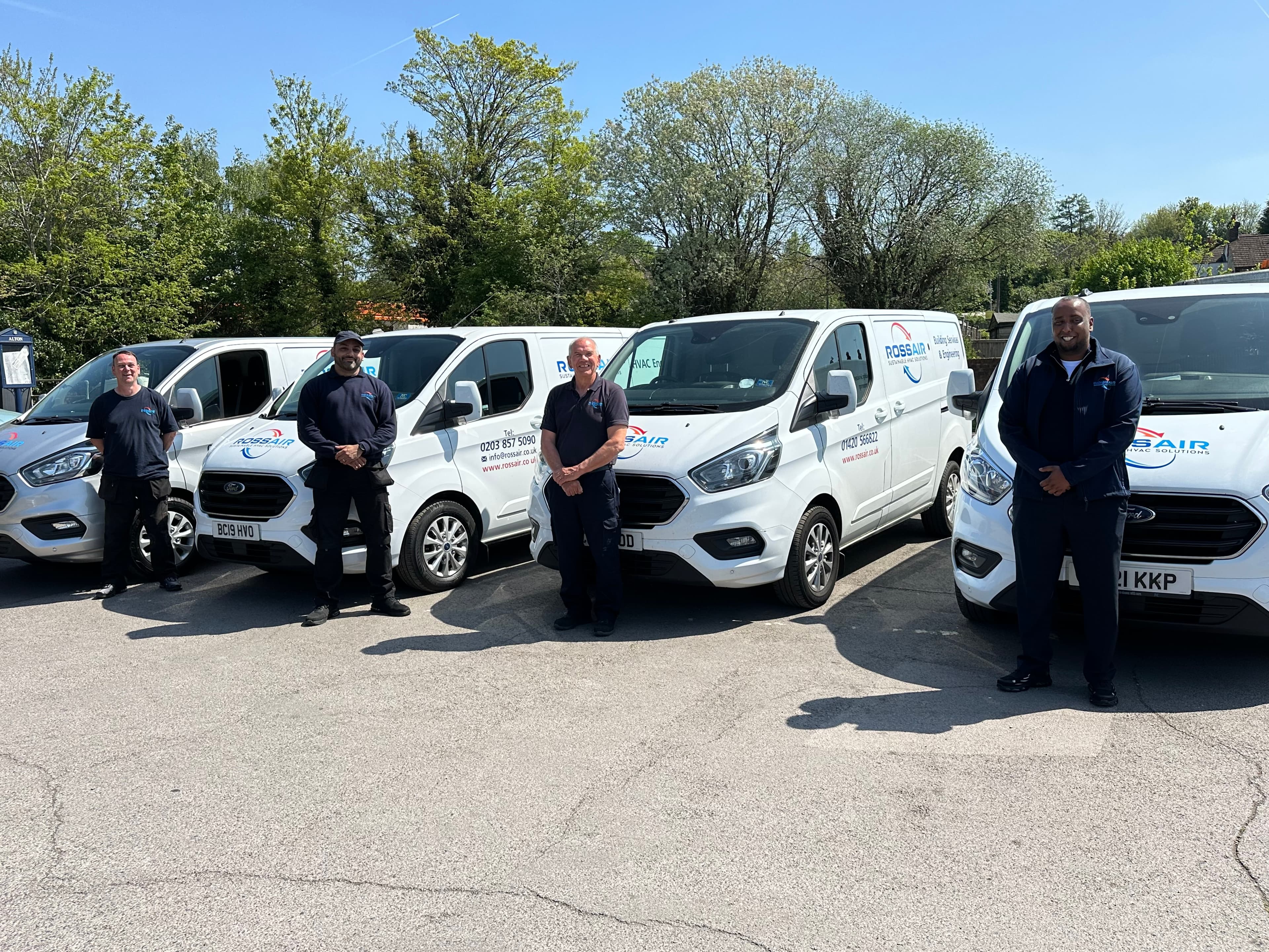 Rossair engineers with the company van fleet